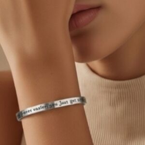 Silver Inspirational Bracelet "It never gets easier, you just get stronger"